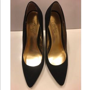 Black Thalia Sodi pumps with gold accent heel